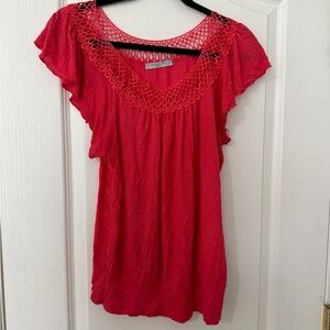 Robin’s Nest size large maternity top in coral color.